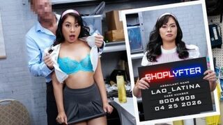 Lao Latina strips & flaunts her shaved pussy in shoplyfter shoot