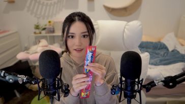 AngelsKimi AKA Plushys Teasing Fans While Eating Candy And Whispering ASMR Video