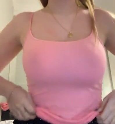 Blonde showing her breasts in this video